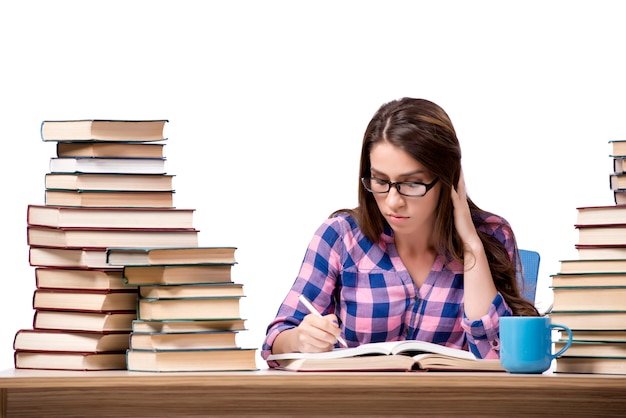 Young student preparing to the college exams isolated on white