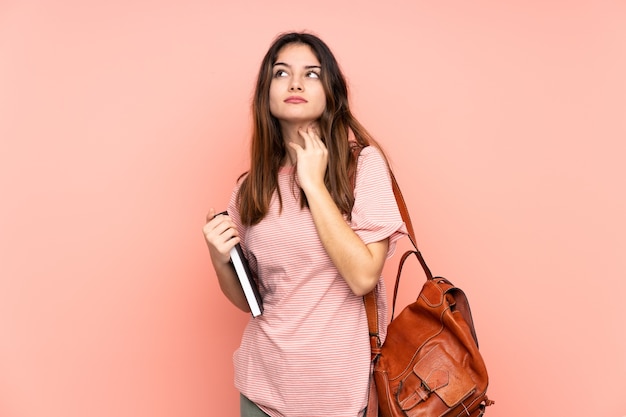 Young student woman going to the university