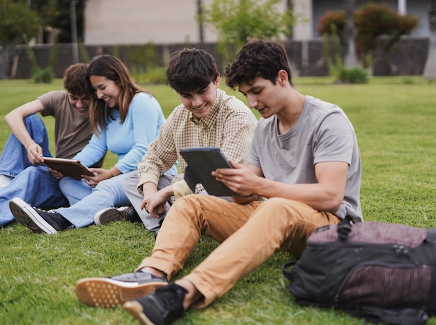 Young students learning together outside of universtiy