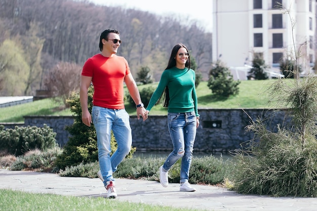 Young stylish couple in park