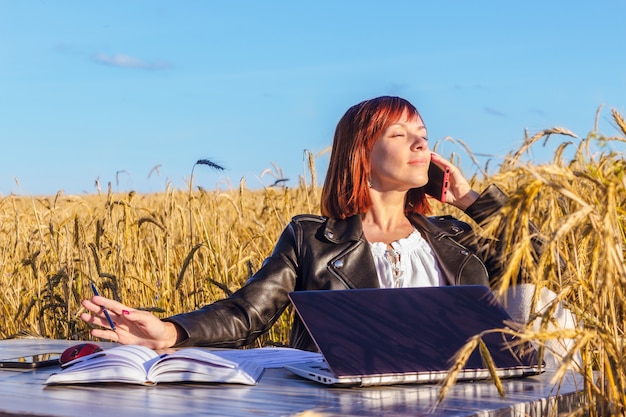 Young successful business lady is doing her own business where she wants