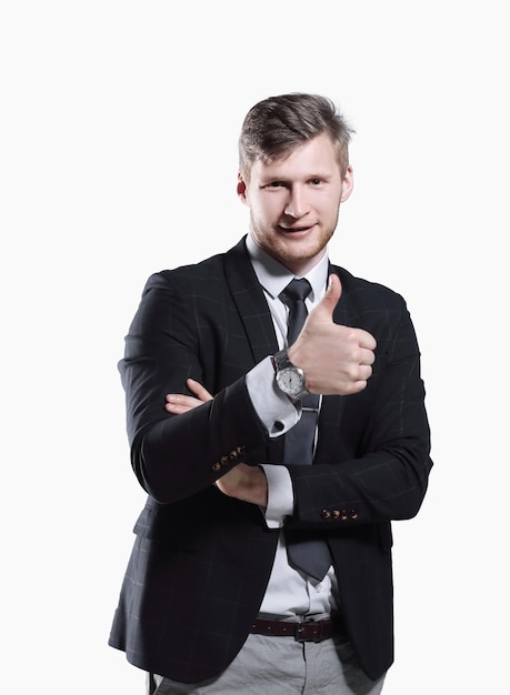 Young successful businessman showing thumb up photo with copy space