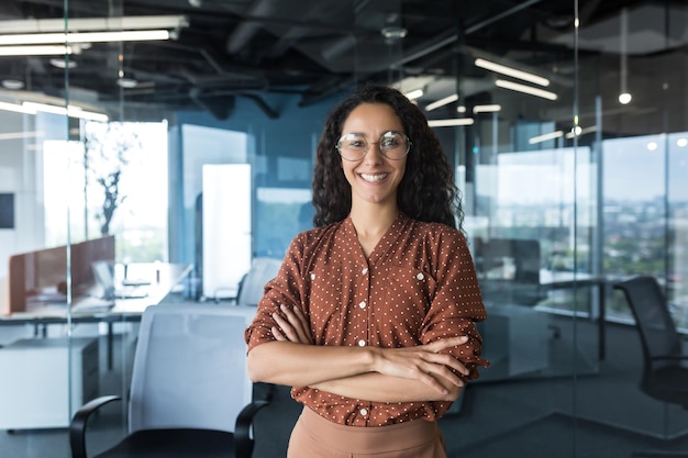 Young successful indian it developer female engineer working inside the office of a development