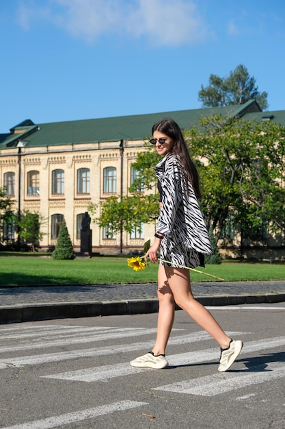 Young tall girl with long straight hair