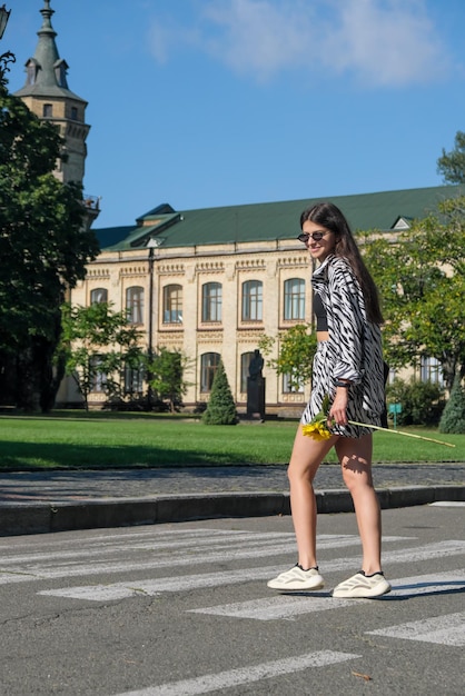 Young tall girl with long straight hair