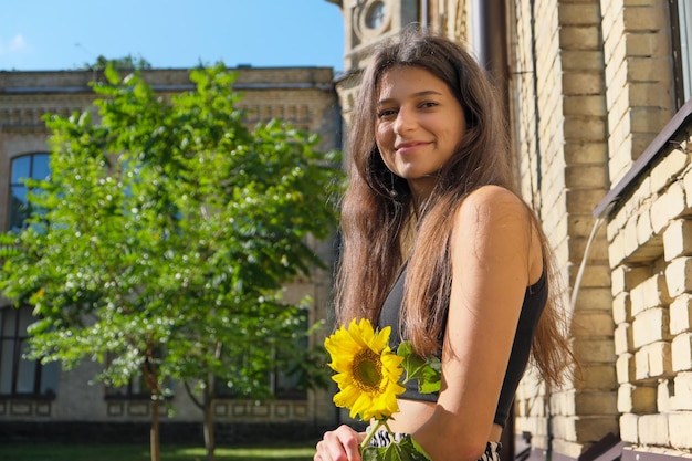 Young tall girl with long straight hair