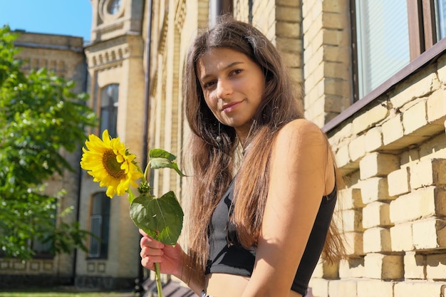 Young tall girl with long straight hair