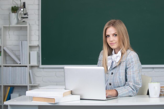 Young teacher female student on lesson lecture in classroom at high school or college