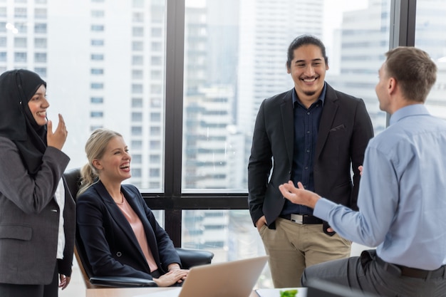 Young team of coworkers making great business discussion