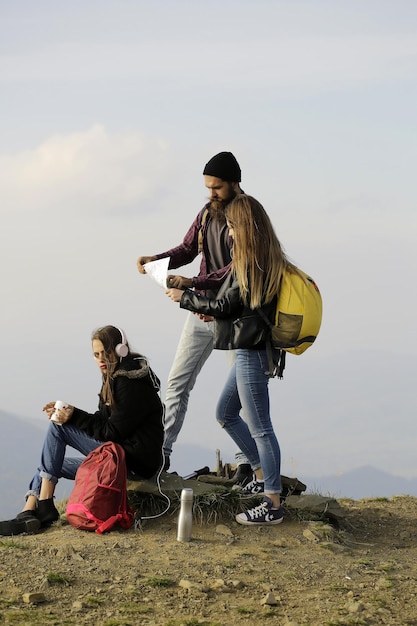 Young travelers with map