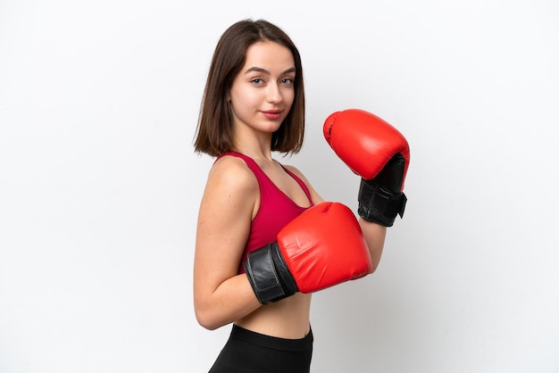 Young Ukrainian woman isolated on white background with boxing gloves