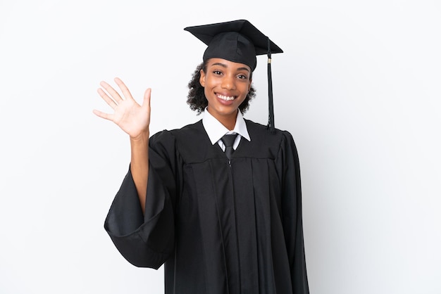 Young university graduate African American woman isolated on white background counting five with fingers