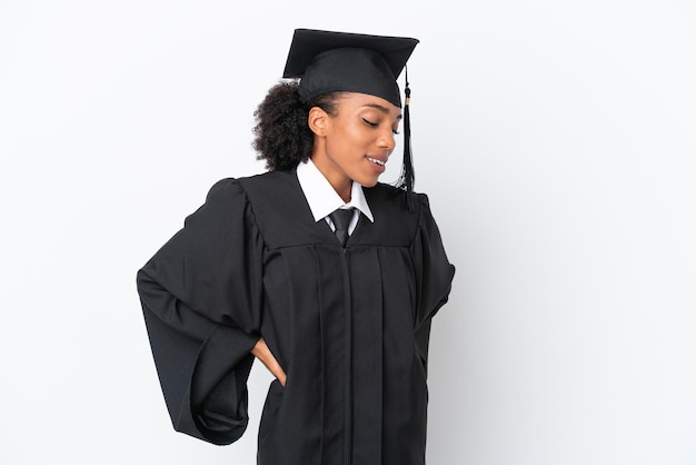 Young university graduate African American woman isolated on white background suffering from backache for having made an effort