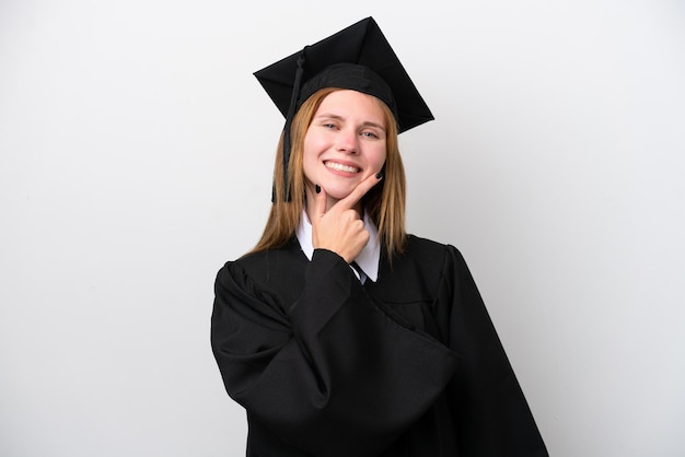 Young university graduate English woman isolated on white background smiling