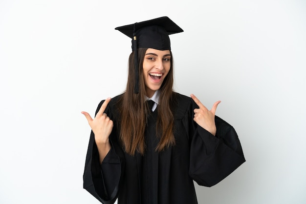 Young university graduate isolated on white background giving a thumbs up gesture