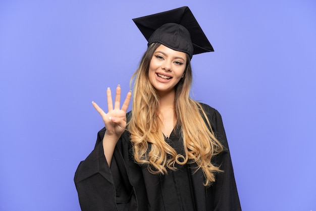 Young university graduate Russian girl isolated on white background happy and counting four with fingers