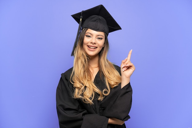 Young university graduate Russian girl isolated on white background showing and lifting a finger in sign of the best