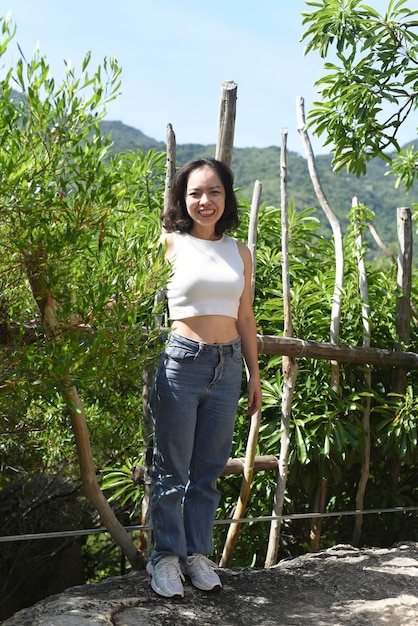 Young Vietnamese woman going for a stroll in a park