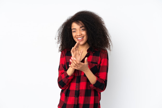 Young woman over applauding after presentation in a conference