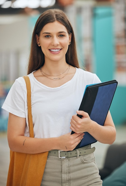 Young woman college student portrait and university campus for learning school studying and higher education knowledge in Canada Happy proud and motivation of gen z youth portrait with notebooks