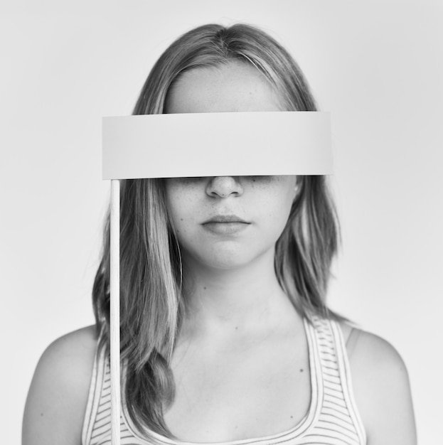 Young Woman Covering Eyes Concept