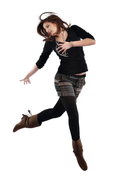 young woman dancing isolated on white background