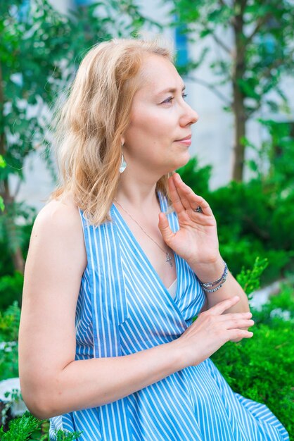 A young woman dreams in the park