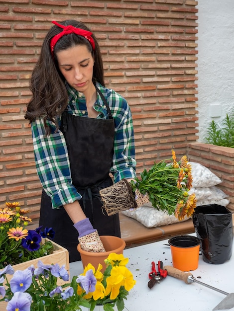 Young Woman Gardening At Home