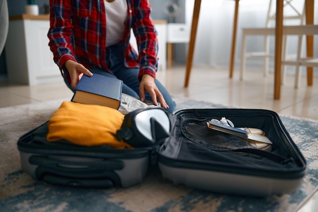 Young woman getting ready on weekend vacation