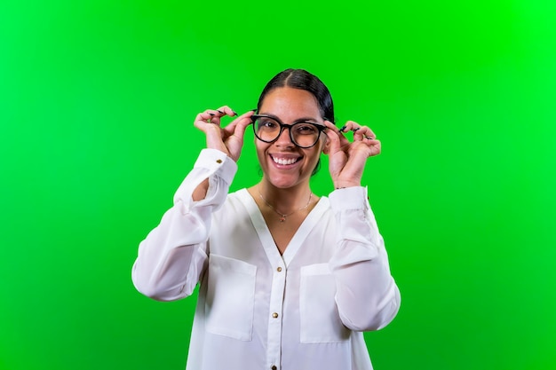 Young woman glasses with green background