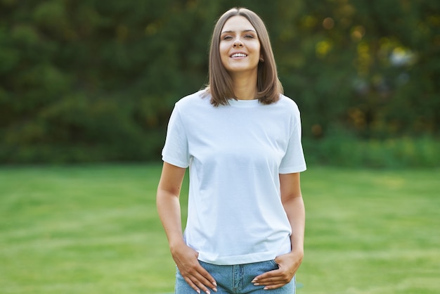 Young woman in gray shirt. High quality photo