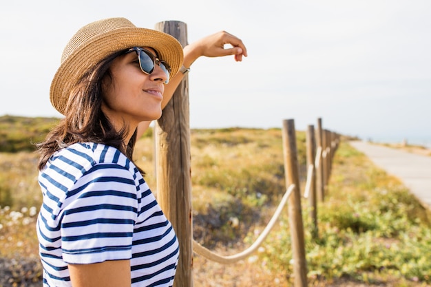 Young woman happy in the countryside