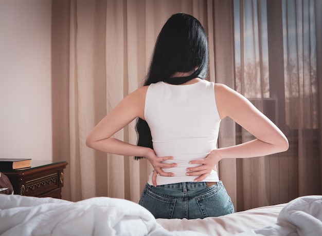 Young woman has kidney pain