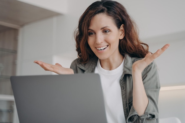 Young woman has video call on laptop and have talk Online meeting and remote communication