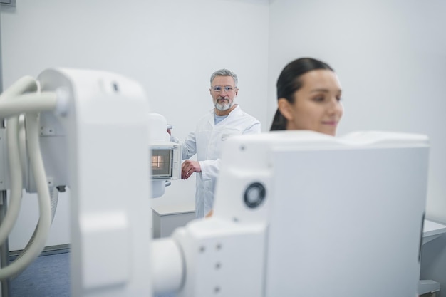 Young woman having a procedure of mammography