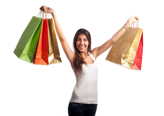 young woman holding shopping bags