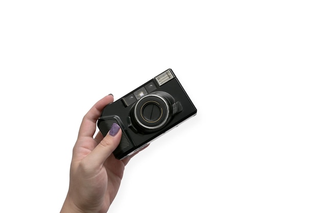 Young woman holding vintage camera isolated on white background with copy space