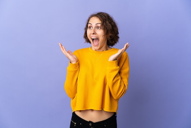 Young woman isolated with surprise facial expression