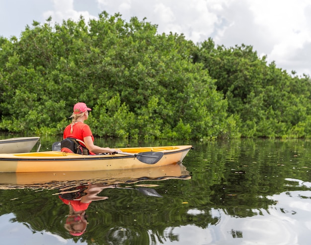 Young woman kayaking in Everglades National park