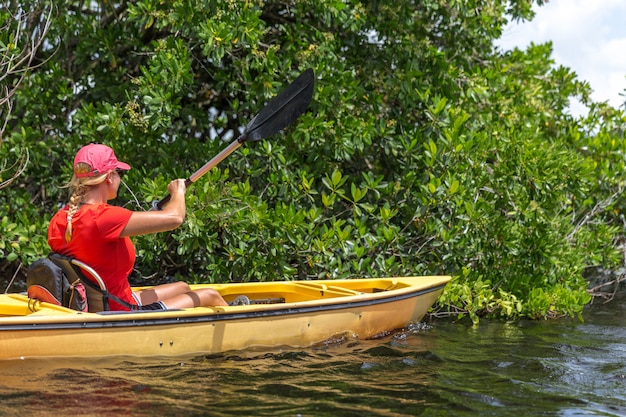 Young woman kayaking in Everglades National park