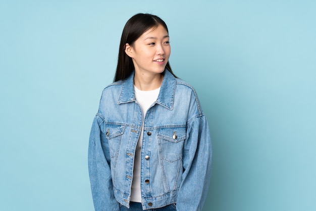 Young woman on looking to the side and smiling