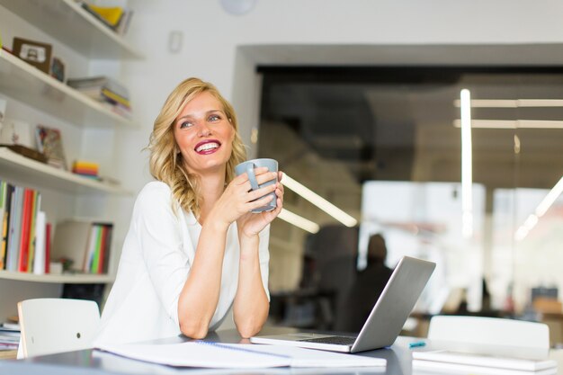 Young woman in the office