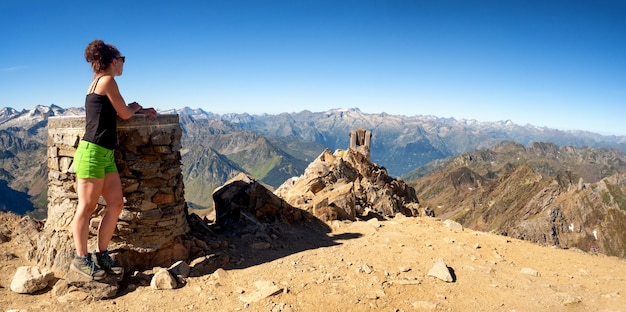 Young woman and Pic du Midi de Bigorre, France