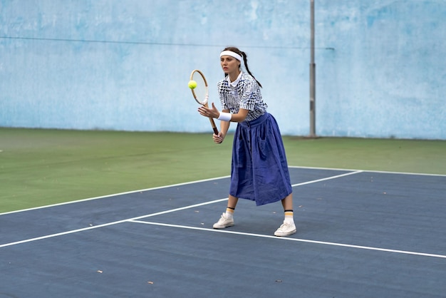 young woman playing tennis