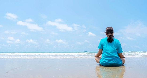 Young woman practicing yoga outdoors