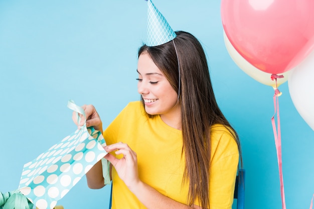 Young woman preparing a birthday party