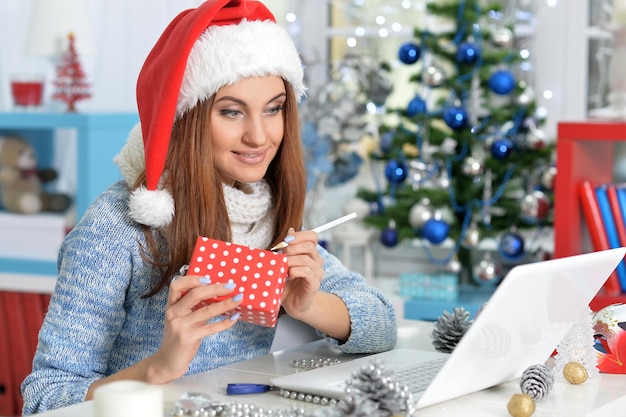 Young woman preparing for Christmas