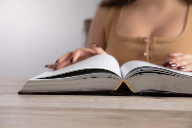 Young woman reading a book