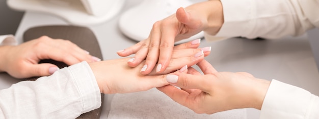 Young woman receiving oil massage