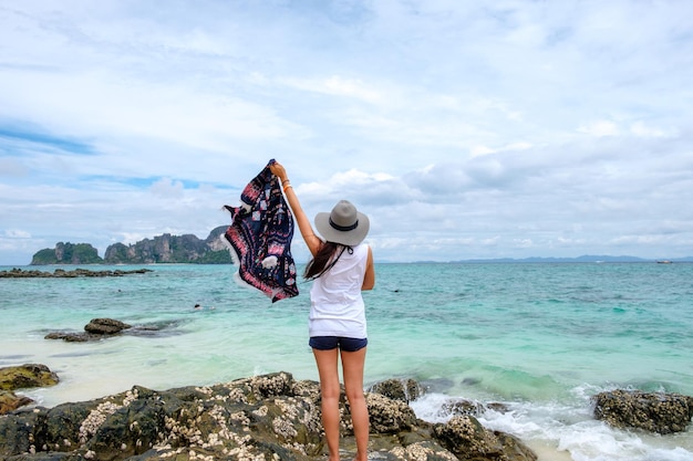 Young woman relaxing enjoy on tropical beach